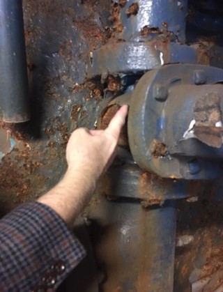 Pointing out problem with equipment in water system.